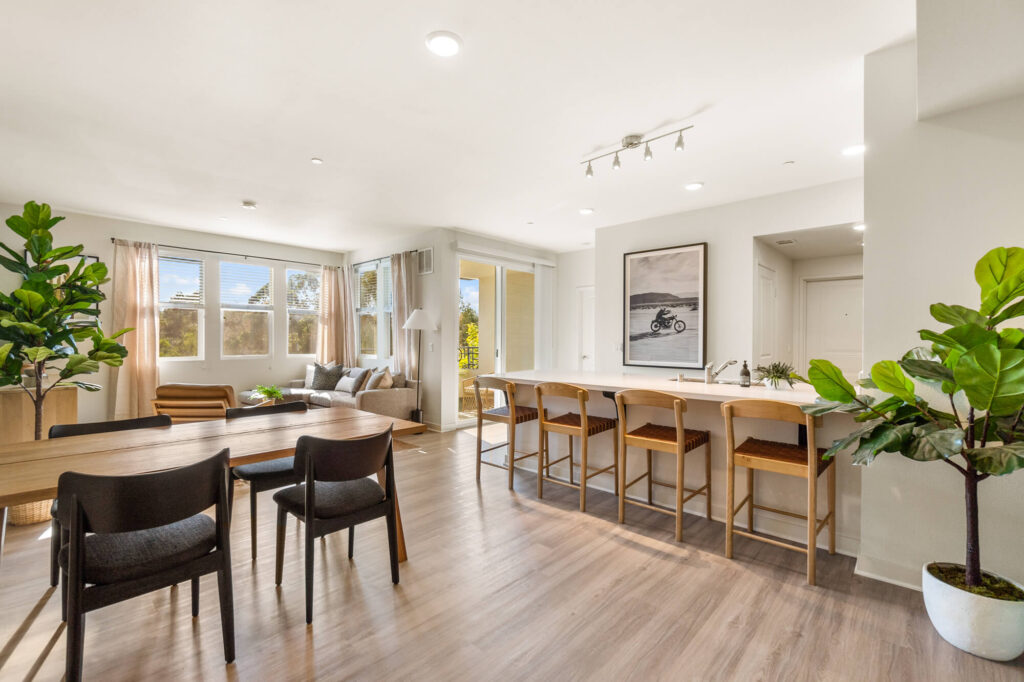 Open concept living room and kitchen at Ascent at Campus of Life apartments for rent in San Diego