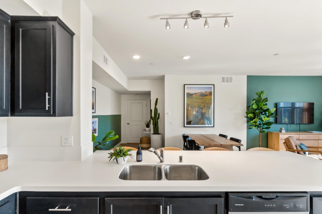Kitchen with view into the dining and living rooms